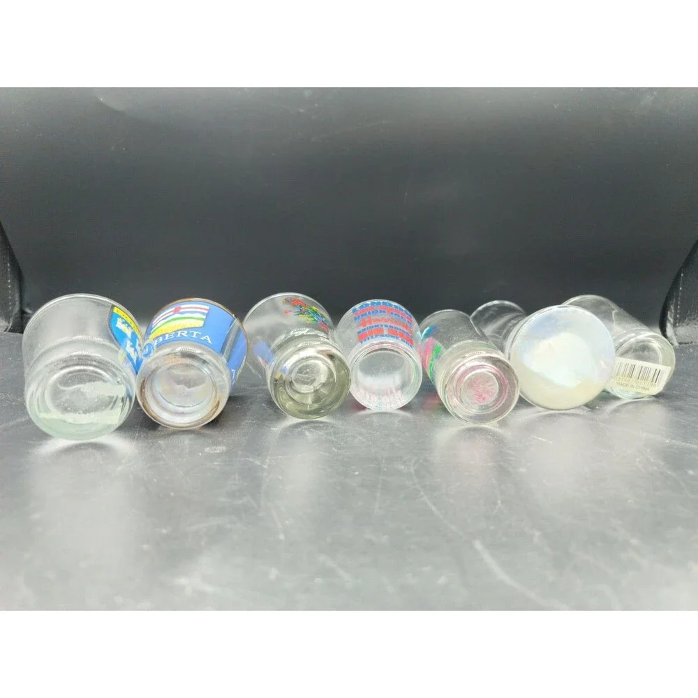 Lot of 7 Country Souvenir Shot Glasses Mexico England Dublin Canada Brazil Scotl